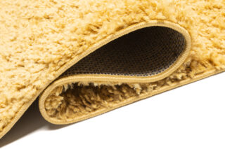 Vloerkleed Essence Shaggy Effen Mosterd