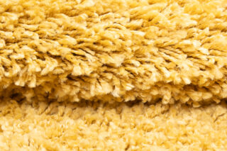Vloerkleed Essence Shaggy Effen Mosterd
